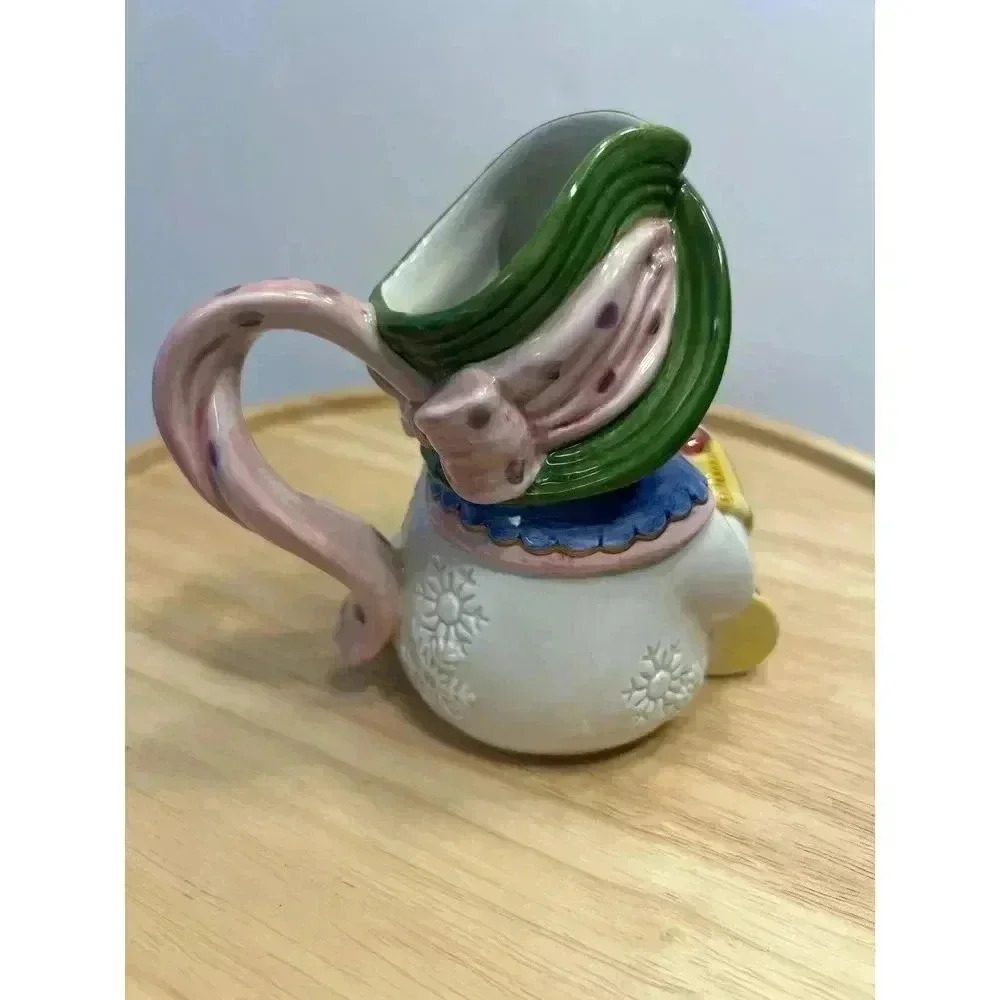 Fitz and Floyd Snowman Creamer from Frosty Folks Collection Holding Gift - Picture 3 of 7
